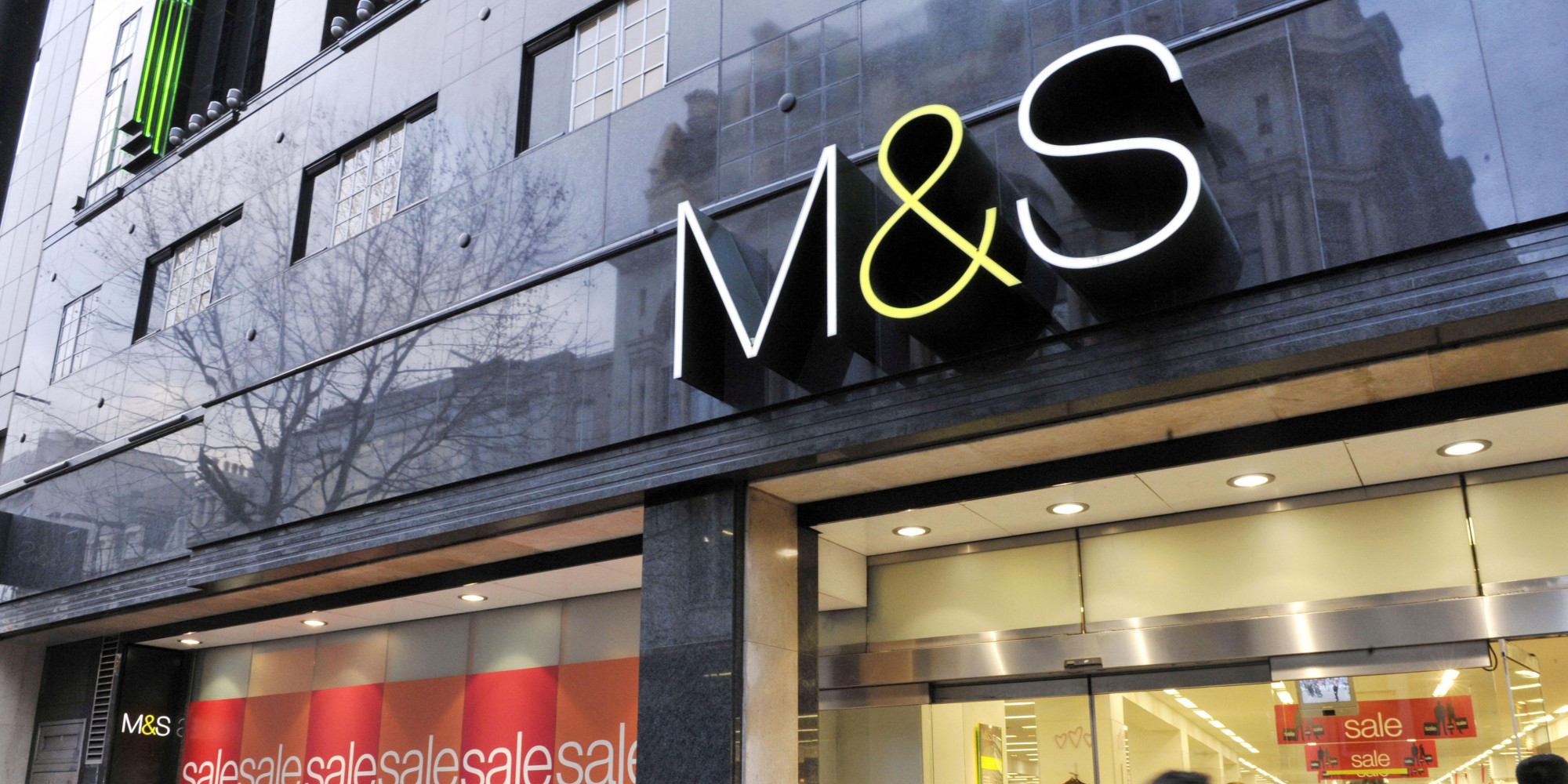 Shoppers outside Marks and Spencer on Oxford Street, London, as two of the UK's biggest retailers opened their stores to post-Christmas bargain hunters today as figures showed a big rise in shoppers on the streets.