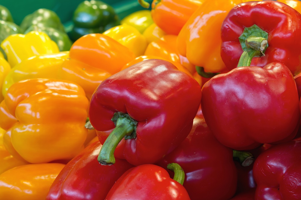Red Yellow and Green Bell Peppers Vegetable Stall Display