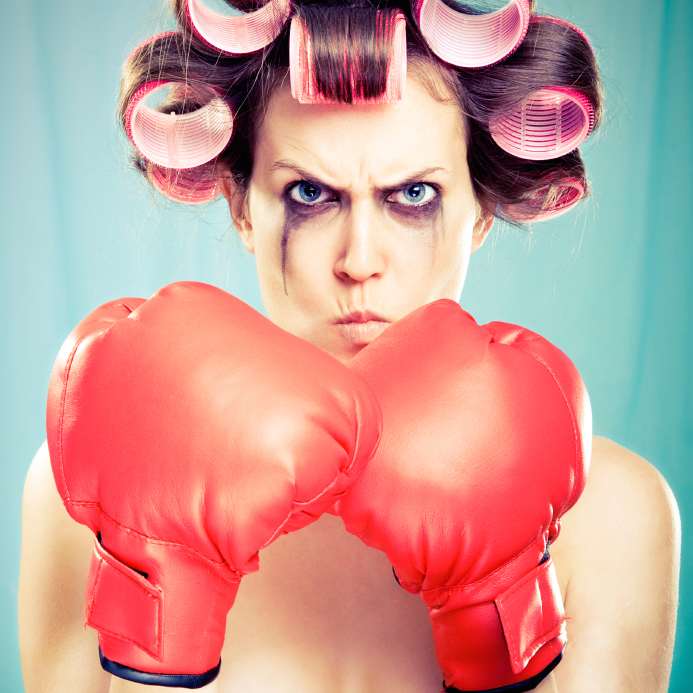 woman-with-boxing-gloves-7-ways-to-prevent-PMS-by-healthista.com-in-story