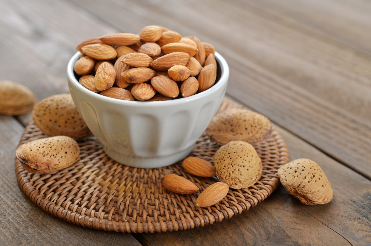 A-small-bowl-filled-with-fresh-Almonds.-Perfect-and-healthy-snack