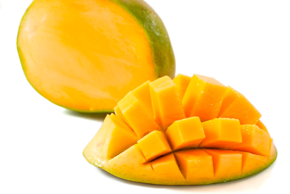 cubed mango isolated on white background with clipping path